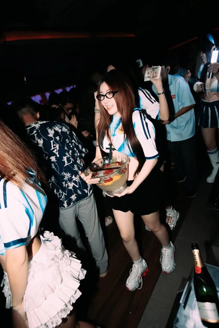 Table service moment at Neighborhood Club — night club District 1 Saigon